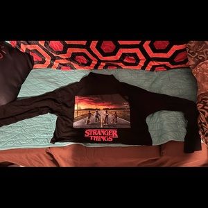Ladies size M, Stranger Things long sleeve cropped tee.
